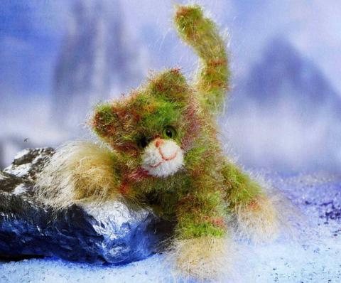 Пушистый котенок